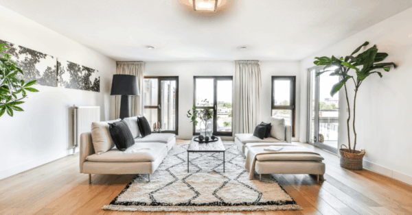 Choosing the Right Shutters for Your Living Room: Tips and Trends - Shaded Window Coverings